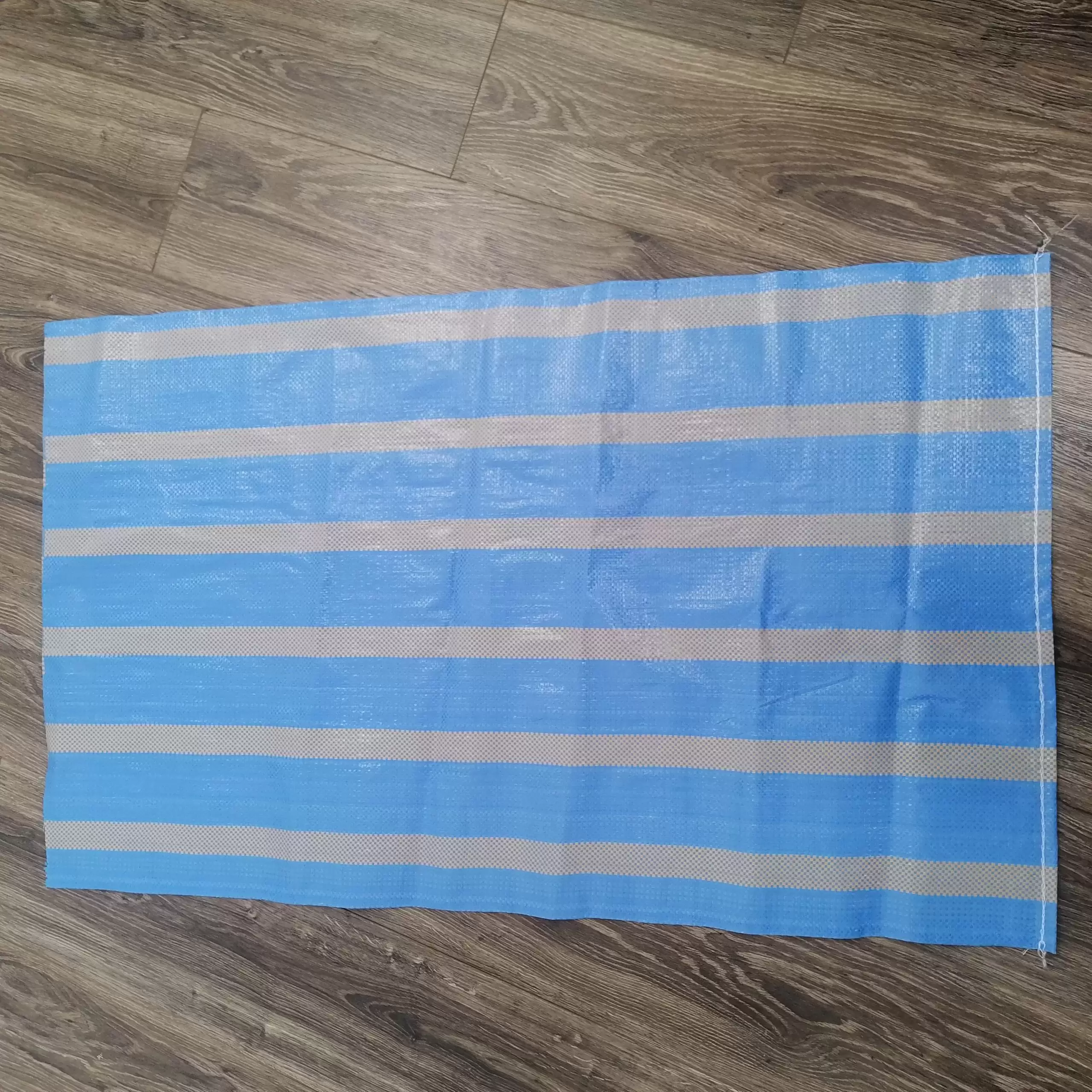 Woven bag with blue-orange stripes 
